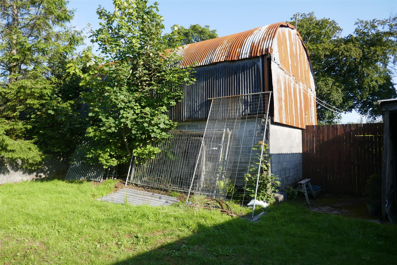 IMPLEMENT SHED